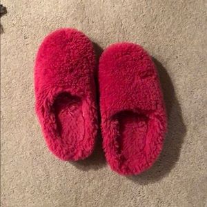 Pink fuzzy slippers
